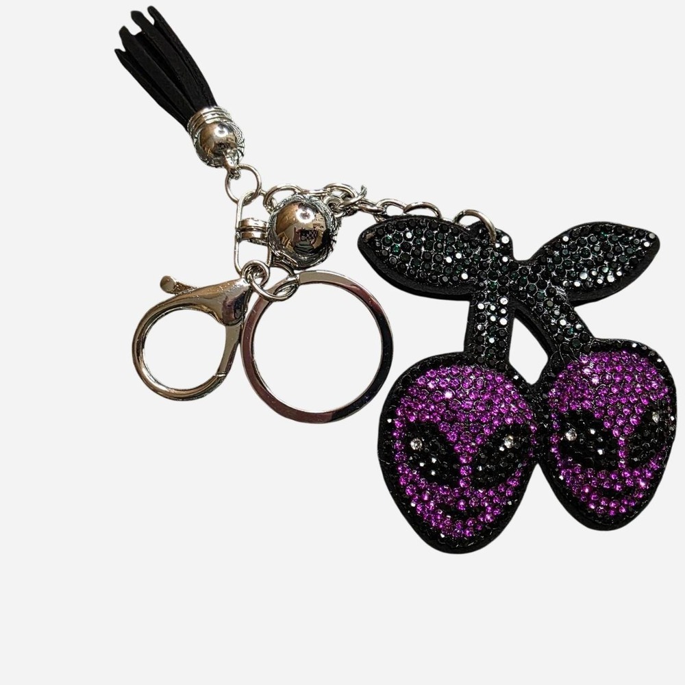 Purple and black rhinestone alien keychains